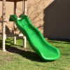 An image showing a wave slide on a playset